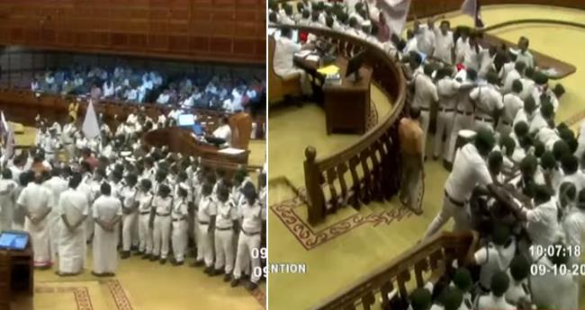 നി​യ​മ​സ​ഭ​യി​ല്‍ ചീ​ഫ് മാ​ർ​ഷ​ലി​നെ മ​ര്‍​ദി​ച്ച സം​ഭ​വം: മൂ​ന്ന് പ്ര​തി​പ​ക്ഷ എം​എ​ൽ​എ​മാ​ർ​ക്ക് സ​സ്പെ​ൻ​ഷ​ൻ