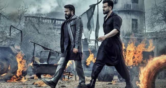വി​വാ​ദ കൊ​ടു​ങ്കാ​റ്റ്;"​ക​ത്രി​ക​വ​ച്ച' എ​മ്പു​രാ​ൻ ഇ​ന്ന് തി​യ​റ്റ​റി​ൽ