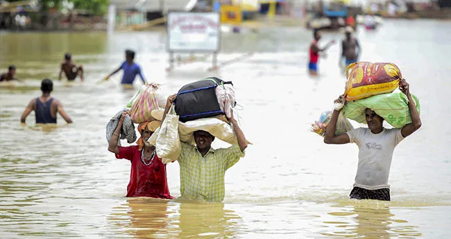 പ്രളയക്കെടുതിയിൽ വടക്കുകിഴക്കൻ സംസ്ഥാനങ്ങൾ; 34 മ​​​​​​ര​​​​​​ണം, ആ​​​​​​യി​​​​​​ര​​​​​​ക്ക​​​​​​ണ​​​​​​ക്കി​​​​​​നു വീ​​​​​​ടു​​​​​​ക​​​​​​ൾ ത​​​​​​ക​​​​​​ർ​​​​​​ന്നു