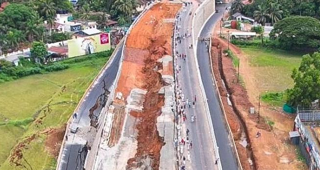 ത​ക​ര്‍​ന്ന ദേ​ശീ​യ​പാ​ത ഉ​ന്ന​ത നി​ല​വാ​ര​ത്തിൽ  പു​തു​ക്കി​പ്പ​ണിയണം: ഹൈ​ക്കോ​ട​തി