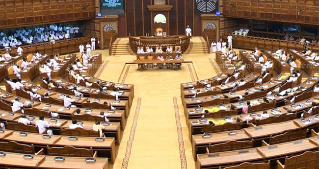 നി​യ​മ​സ​ഭ​യി​ൽ പ്ര​തി​പ​ക്ഷ പ്ര​തി​ഷേ​ധം തു​ട​രു​ന്നു
