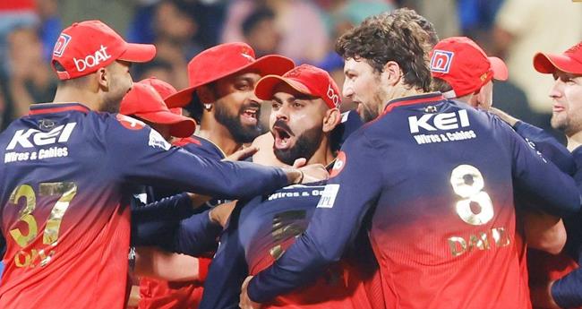 ഐ​പി​എ​ൽ; മും​ബൈ ഇ​ന്ത്യ​ൻ​സി​നെ മു​ട്ടു​കു​ത്തി​ച്ച് ആ​ർ​സി​ബി
