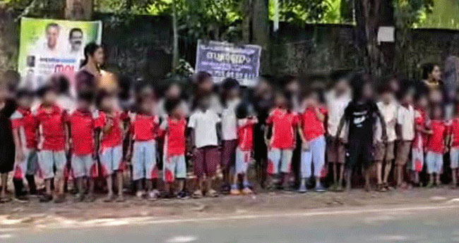 കു​ട്ടി​ക​ളെ റോ​ഡ​രികി​ൽ നി​ർ​ത്തി​യ സം​ഭ​വം;  പ്ര​ധാ​നാ​ധ്യാ​പ​ക​നു കാ​ര​ണം കാ​ണി​ക്ക​ൽ  നോ​ട്ടീ​സ് ന​ല്കി സ​ർ​ക്കാ​ർ ത​ല​യൂ​രി