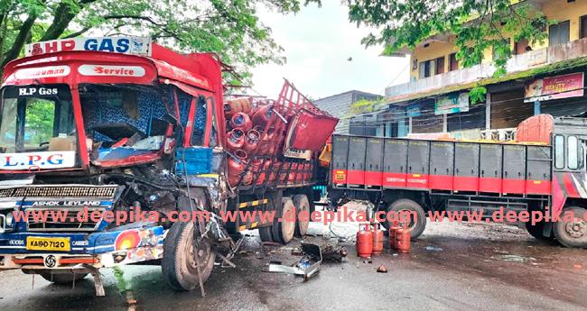 ദേ​ശീ​യ​പാ​ത​യി​ൽ നി​ർ​ത്തി​യി​ട്ട ലോ​റി​യു​ടെ  പി​റ​കി​ൽ ഗ്യാ​സ് സി​ലി​ണ്ട​ർ ലോ​റി​യി​ടി​ച്ച് അപകടം