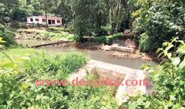 കു​ഴി​യോ​ടി​പ്പ​ടി പാ​ല​ത്തി​ന്‍റെ നി​ര്‍​മാ​ണം മു​ട​ങ്ങി: നാ​ട്ടു​കാ​ർ സ​മ​ര​ത്തി​ലേ​ക്ക്