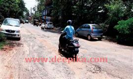 ന​ഗ​ര​ത്തി​ൽ ഗ​താ​ഗ​ത​ക്കു​രു​ക്ക്;  പൊ​ട്ടി​പ്പൊ​ളി​ഞ്ഞ് സ​മാ​ന്ത​ര​പാ​ത